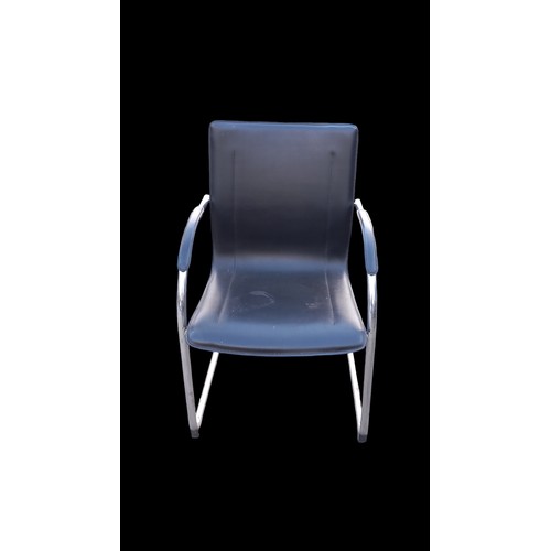 113 - A CHROME & LEATHER ARMCHAIR