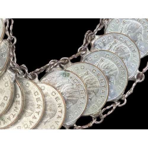 213 - A VINTAGE MEXICAN COIN BRACELET