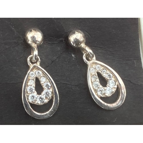 214 - A PAIR OF ORNATE DROP SILVER EARRINGS