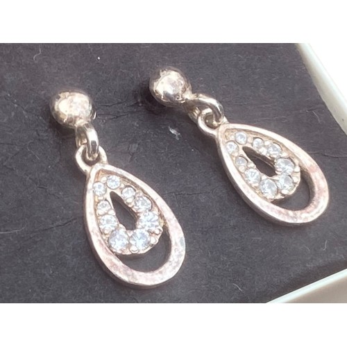 214 - A PAIR OF ORNATE DROP SILVER EARRINGS