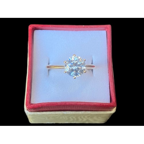 221 - A SILVER GILT LARGE SOLITAIRE RING