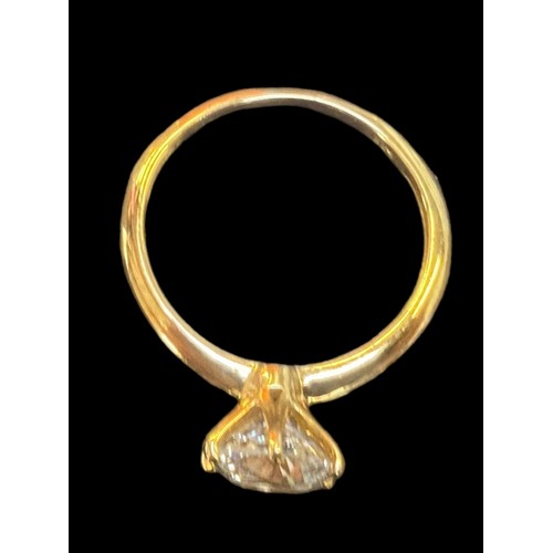 221 - A SILVER GILT LARGE SOLITAIRE RING