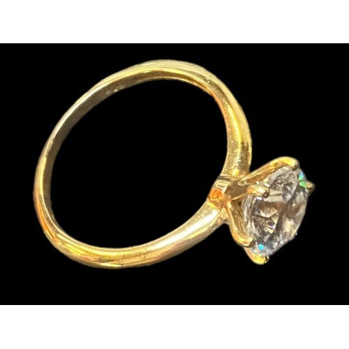 221 - A SILVER GILT LARGE SOLITAIRE RING