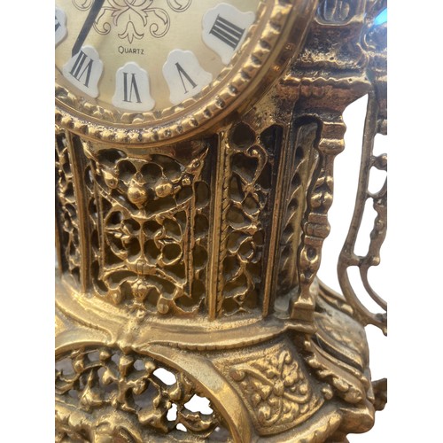 167 - AN ORNATE HEAVY BRASS CLOCK 11x19