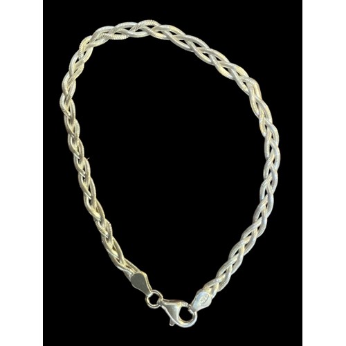 236 - A SILVER CELTIC WEAVE BRACELET