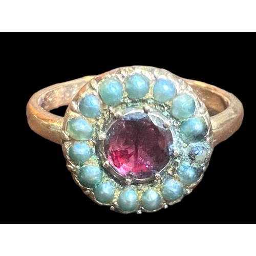 563 - AN ANTIQUE ROSE GOLD SEED PEARL & RUBY RING