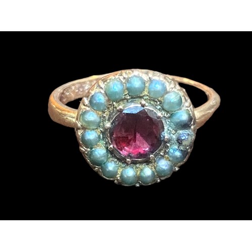 563 - AN ANTIQUE ROSE GOLD SEED PEARL & RUBY RING