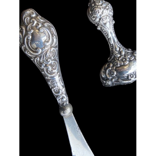 568 - A CHESTER SILVER HANDLED SHOE HORN AND ANOTHER SILVER HANDLED BRUSH