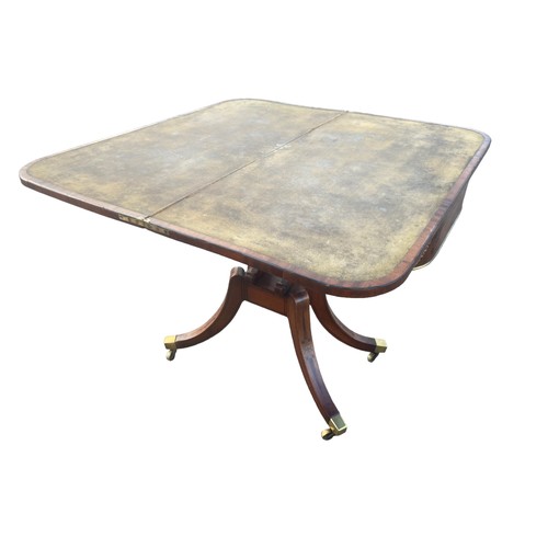 604 - A REGENCY INLAID BRASS MOUNTED CARD TABLE ADORNED WITH A BRASS LOIN HEAD ON A QUAD BASE OF IMMENSE Q... 