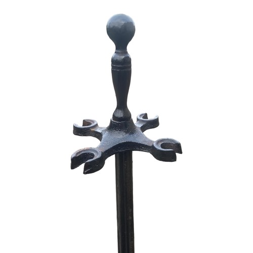 605 - A 6ft TALL VICTORIAN CAST IRON STAND ON PAW FOOT (PROBABLY BILLIARD CUEs)