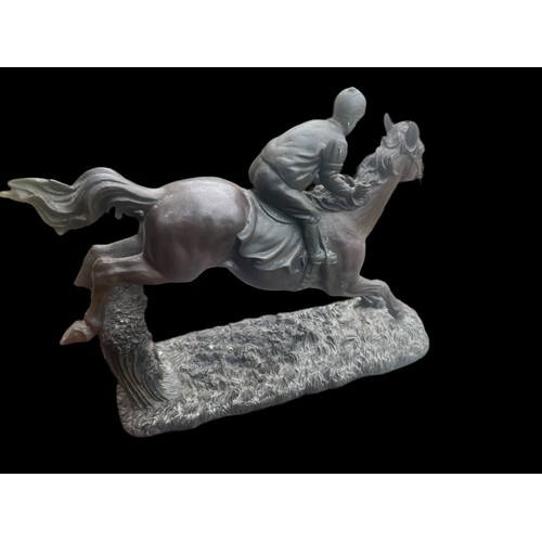 10 - BRONZE EFFECT HORSE AND JOCKEY DAMAGE TO ONE LEG