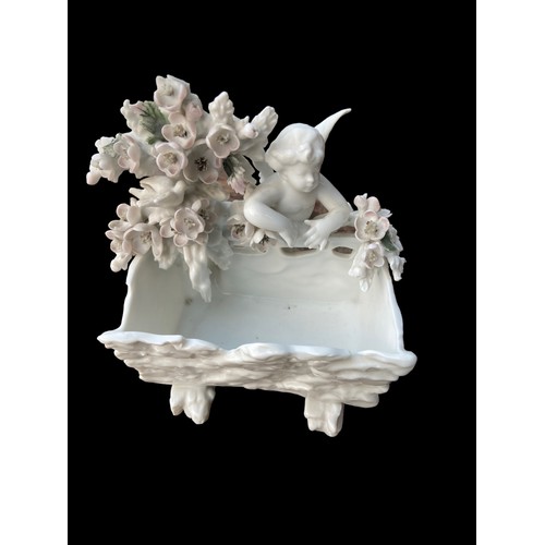 75 - A CHERUB BASKET BY MISSEN 4x5