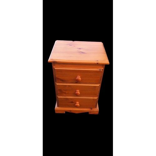 30 - A PINE 3 DRAWERED BEDSIDE