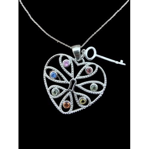 238 - A LARGE OPENWORK GEM SET SILVER HEART PENDANT ON A SILVER CHAIN