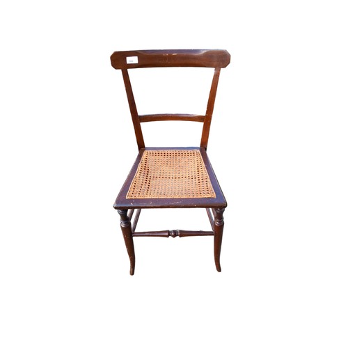 100 - AN ANTIQUE BERGER CHAIR ON SPLAYED LEG