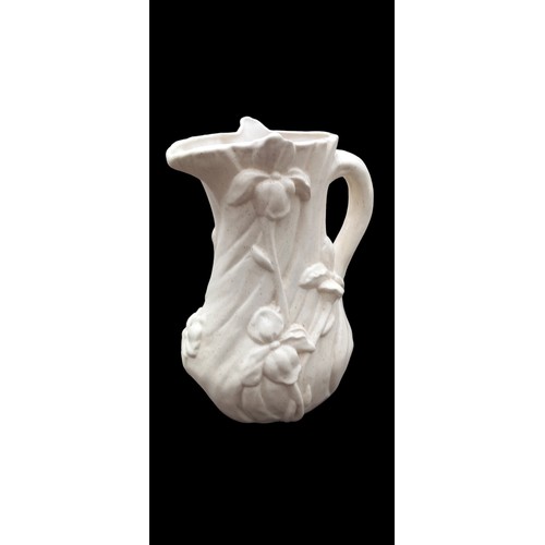 63 - A DECORATIVE JUG 11