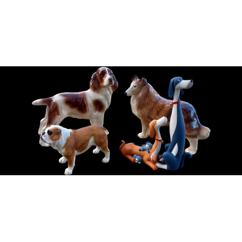 72 - 4 DOG ORNAMENTS