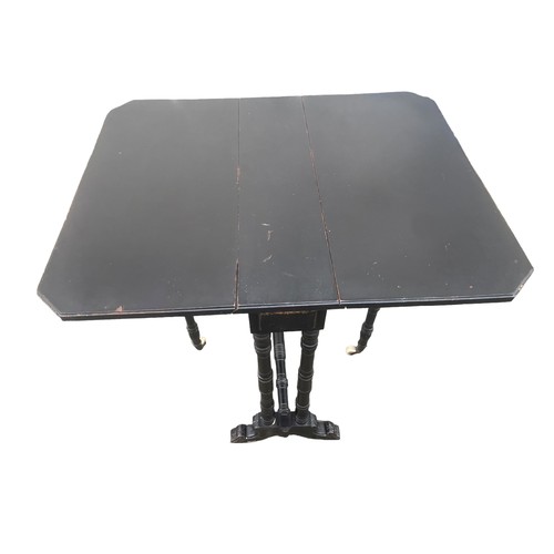 90 - AN ANTIQUE EBONY SUTHERLAND TABLE