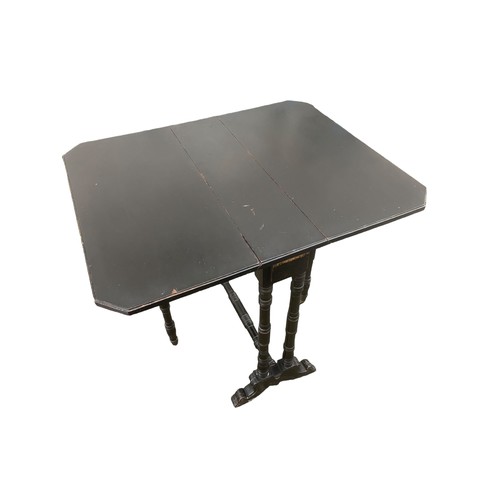 90 - AN ANTIQUE EBONY SUTHERLAND TABLE