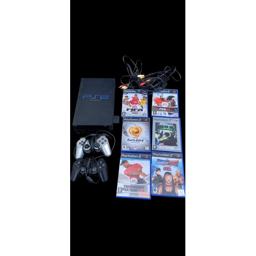 117 - PLAYSTATION 2 WITH GAMES