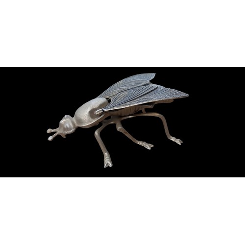 164 - A FLY MADE FROM METAL