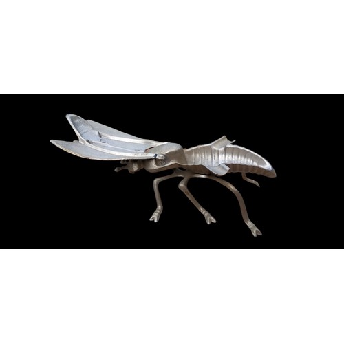 164 - A FLY MADE FROM METAL