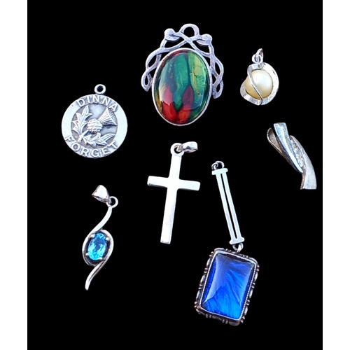 236 - 7 SILVER PENDANTS