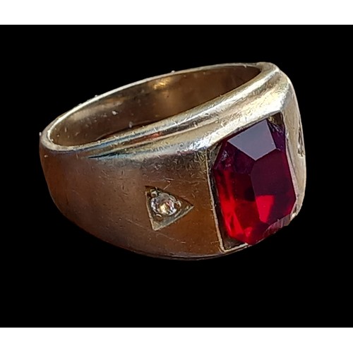 242 - CHUNKY SILVER RING WITH A RED STONE