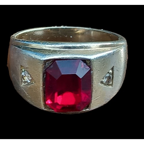 242 - CHUNKY SILVER RING WITH A RED STONE