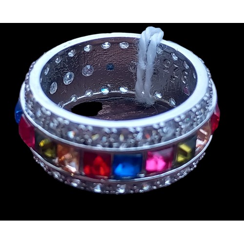 265 - A SILVER MULTI GEM SET RING SIZE P