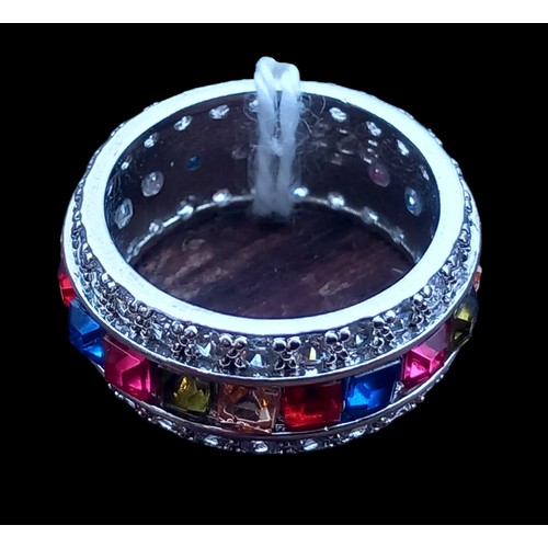 265 - A SILVER MULTI GEM SET RING SIZE P