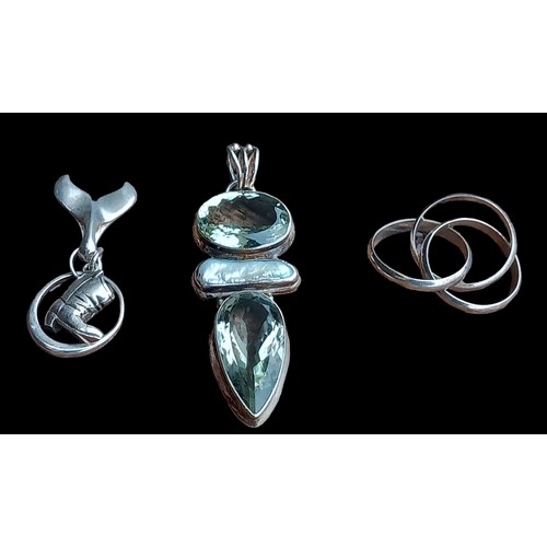 277 - A 4 PIECE LOT OF SILVER JEWELLERY 1 PENDANT, 1 RING & 2 CHARMS