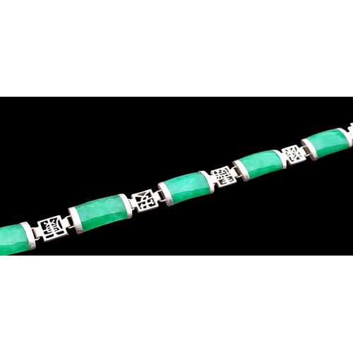 280 - A SILVER JADE BRACELET 7.5