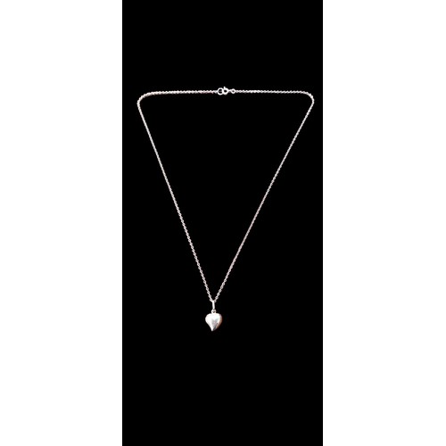 538 - A 9CT HEART PENDANT ON A 9CT CHAIN