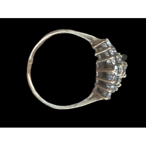 579 - A 9ct GOLD BOAT SHAPED WHITE  STONE RING