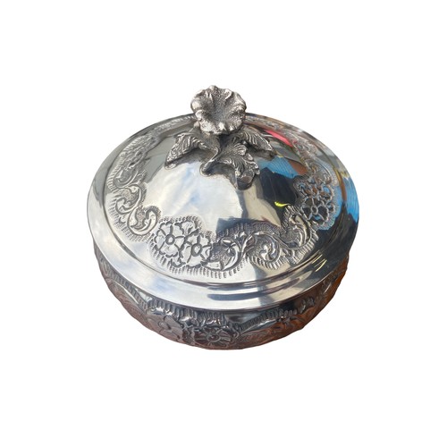 543 - A HEAVILY EMBOSSED WITH FLORAL DESIGN 900 SILVER DISH WITH LID ON TRIPOD FOOT 365.3G