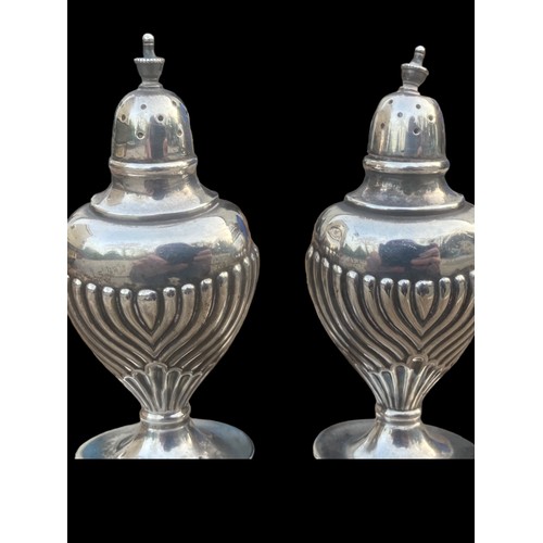 545 - A PAIR OF 1899 SHEFFIELD SILVER (WALKER nd HALL) CONDIMENTS 88.45grms