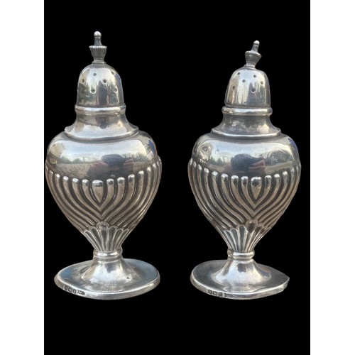 545 - A PAIR OF 1899 SHEFFIELD SILVER (WALKER nd HALL) CONDIMENTS 88.45grms