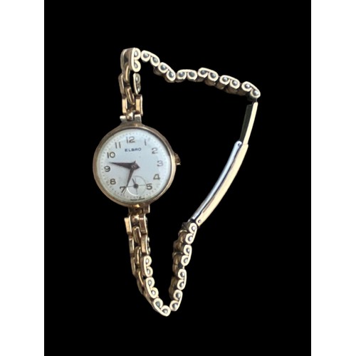 553 - A VINTAGE ELBRO 9ct GOLD WATCH WITH A ROLLED GOLD AND STAINLESS STEEL BRACELET P.W.O