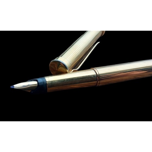 560 - A GOLD PLATED GIANFRANCO FOUNTAIN PEN IN P.W.O