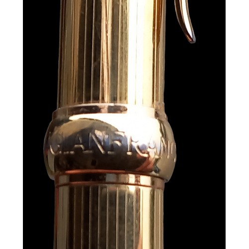 560 - A GOLD PLATED GIANFRANCO FOUNTAIN PEN IN P.W.O