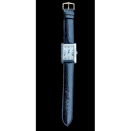 567 - A ROTARY WATCH RETANGULAR WHITE DIAL & DATE WINDOW WORKING ORDER QUARTZ ON BLACK STRAP