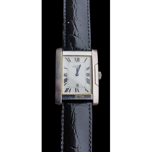567 - A ROTARY WATCH RETANGULAR WHITE DIAL & DATE WINDOW WORKING ORDER QUARTZ ON BLACK STRAP