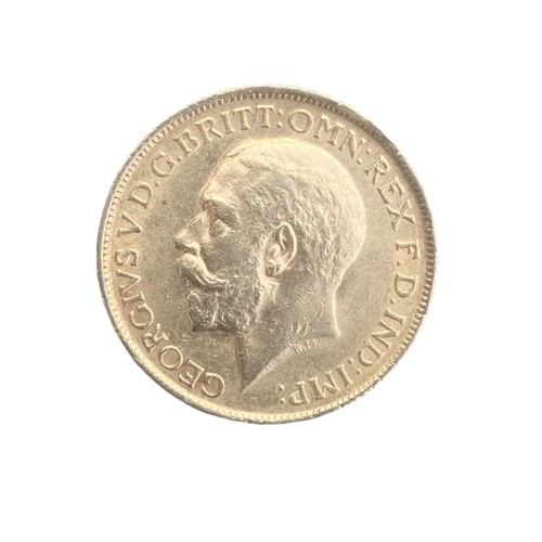 573 - A DOUBLE SILVER SOVEREIGN HOLDER WITH A 1918 SOVERIEGN