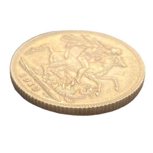 573 - A DOUBLE SILVER SOVEREIGN HOLDER WITH A 1918 SOVERIEGN