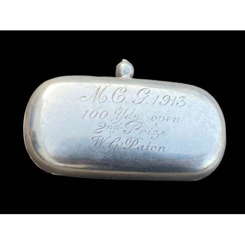 573 - A DOUBLE SILVER SOVEREIGN HOLDER WITH A 1918 SOVERIEGN