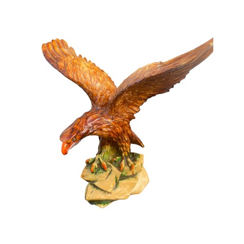 33 - A CARVED EAGLE 12