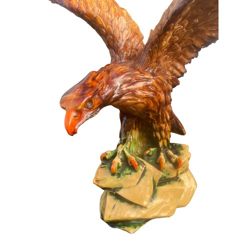 33 - A CARVED EAGLE 12