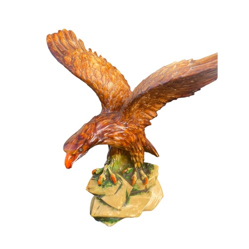 33 - A CARVED EAGLE 12