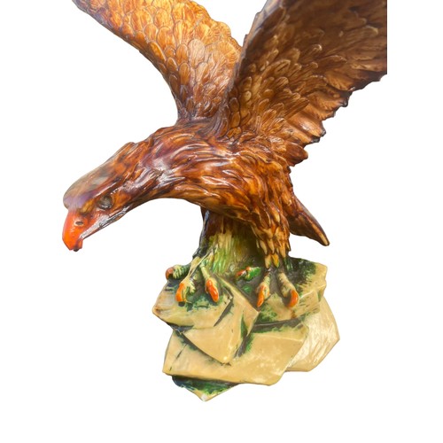 33 - A CARVED EAGLE 12